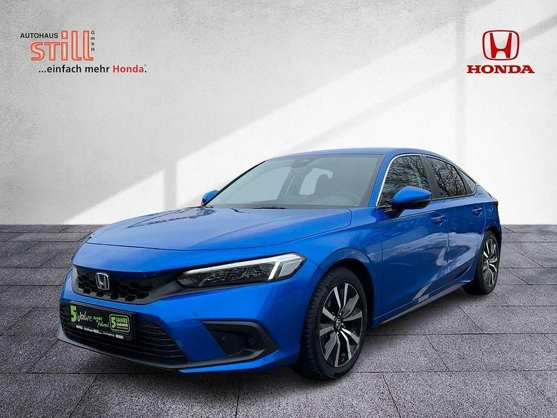 Gebraucht Honda Civic Elegance 184 PS (135 kW) 2023 Prem crystal blue (metallic) Limousine