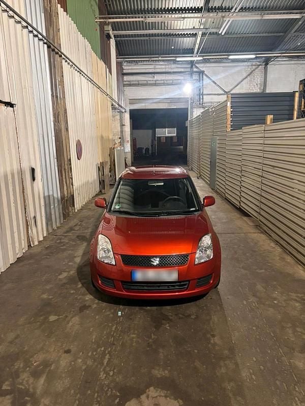 Gebraucht Suzuki Swift 92 PS (67 kW) 2010 Orange Kleinwagen