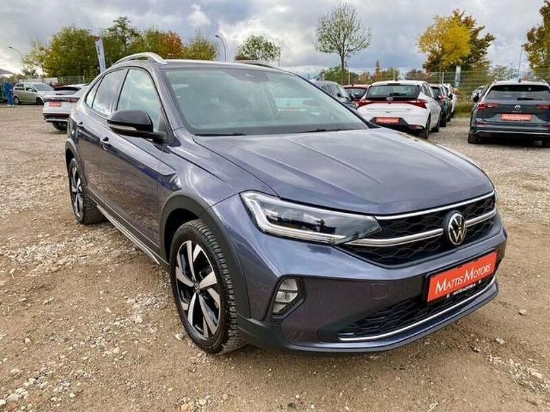 Grau Gebraucht 2024 VW Taigo Style SUV | 20.700 € (Fairer Preis) - Bild 1/4