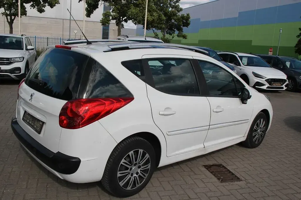 Gebraucht Peugeot 207 Business-Line 92 PS (67 kW) 2011 Weiß Kombi