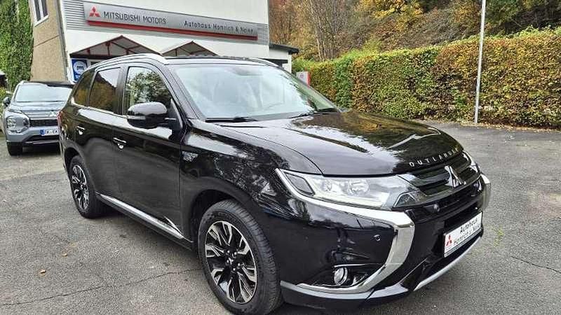 Rubinschwarz Gebraucht 2016 Mitsubishi Outlander P-HEV Top SUV | 15.990 € (Fairer Preis) - Bild 1/4