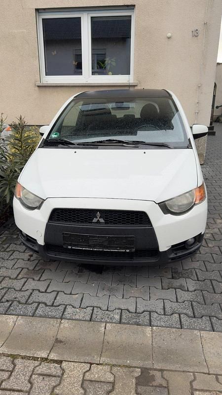 Gebraucht Mitsubishi Colt 95 PS (69 kW) 2010 Weiß Kleinwagen