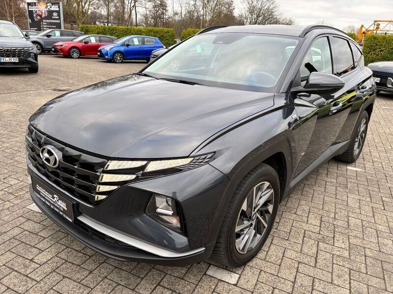 Grau Gebraucht 2021 Hyundai Tucson Pure SUV | 25.990 € (Fairer Preis) - Bild 1/4