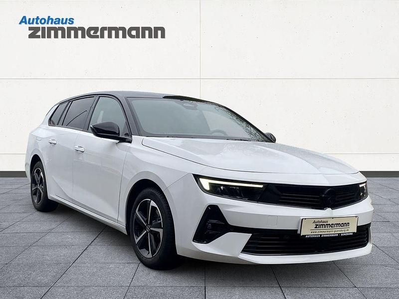 Gebraucht Opel Astra 131 PS (96 kW) 2024 Lack weiss banquise/typ aussenverkleidun Kombi