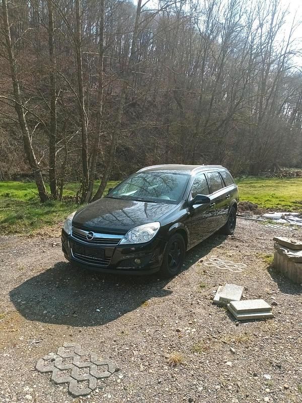 Gebraucht Opel Astra 125 PS (91 kW) 2010 Schwarz Kombi