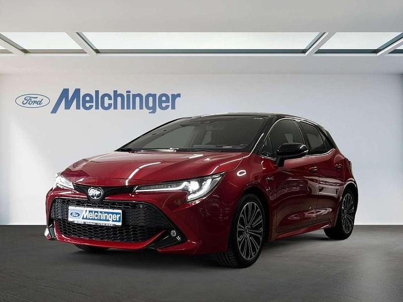 Emotional red 2/ black mica Gebraucht 2019 Toyota Corolla Hybrid Club Kombi | 18.790 € (Superpreis) - Bild 1/4