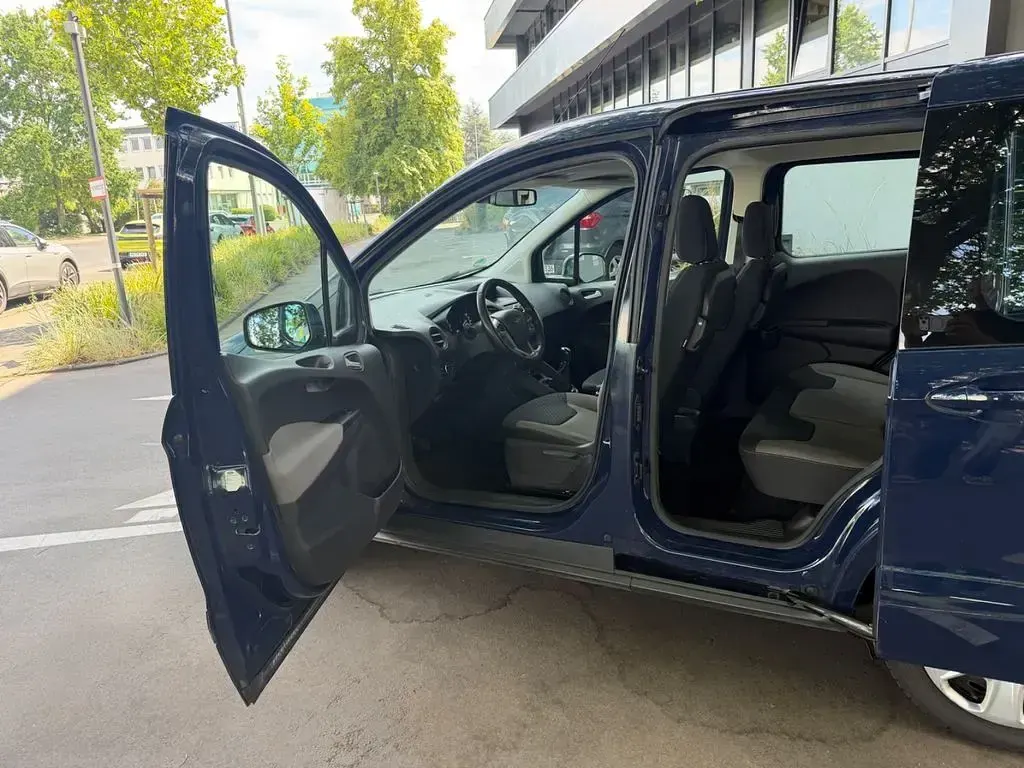 Gebraucht Ford Tourneo Courier Trend 101 PS (74 kW) 2015 Blau Van / Kleinbus