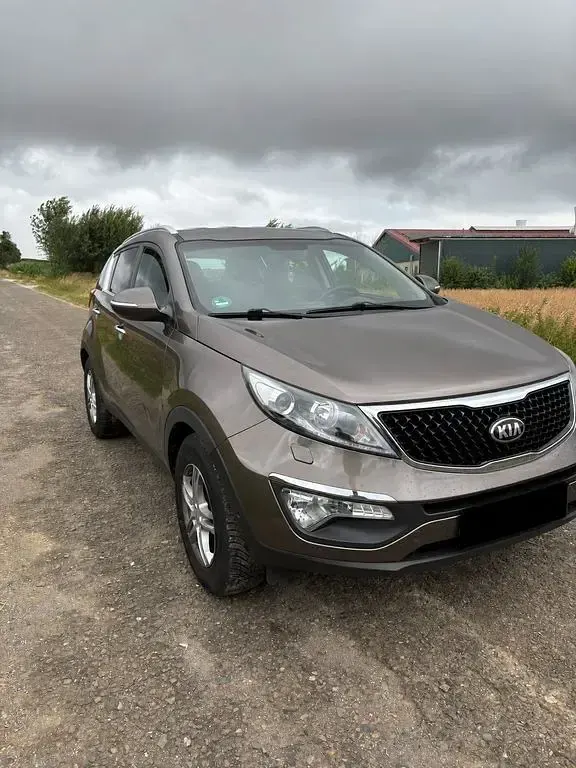 Gebraucht Kia Sportage Edition 7 135 PS (99 kW) 2015 Braun SUV
