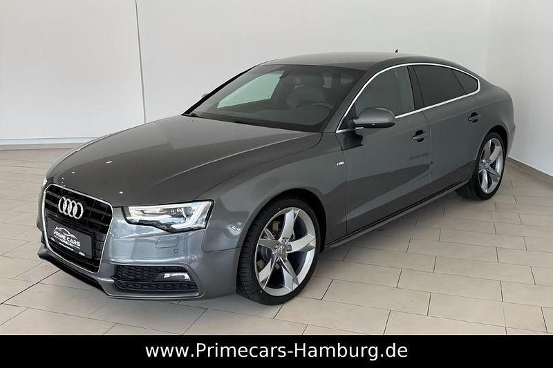 Grau Gebraucht 2015 Audi A5 Sportback S-Line Limousine | 16.990 € (Fairer Preis) - Bild 1/4