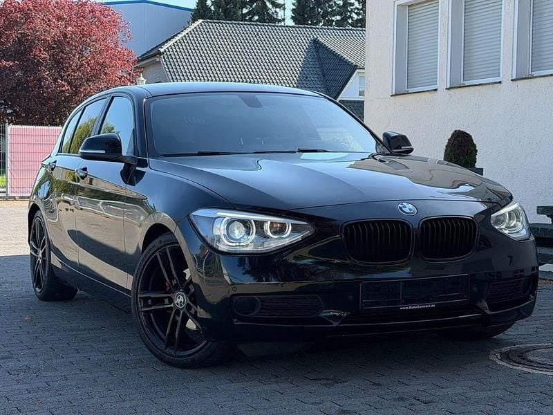 Second-hand BMW 118 Comfort Edition 143 CP (105 kW) 2014 Negru Hatchback
