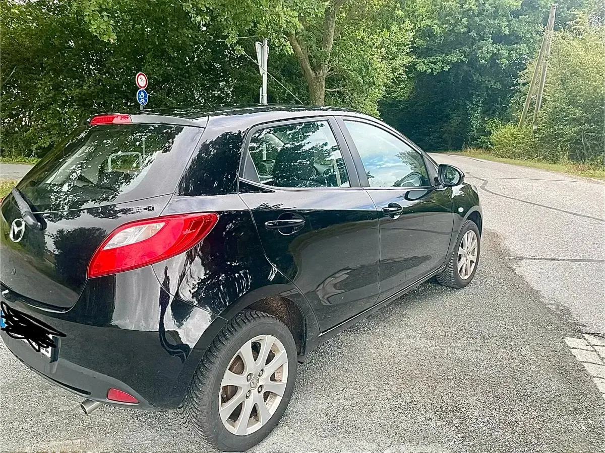 Gebraucht Mazda 2 75 PS (55 kW) 2009 Schwarz Kleinwagen