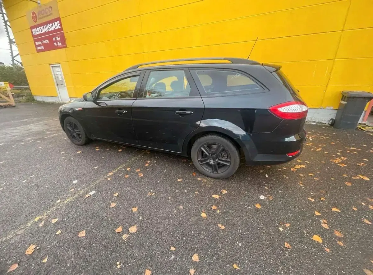 Używany Ford Mondeo 130 KM (95 kW) 2010 Czarny Kombi