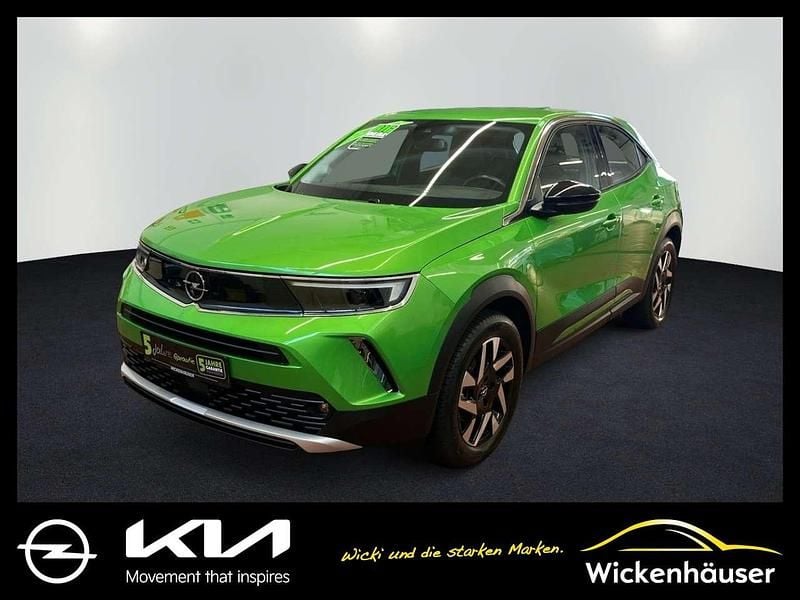Matcha green/ikone gruen Gebraucht 2022 Opel Mokka-e Elegance SUV | 18.490 € (Fairer Preis) - Bild 1/4