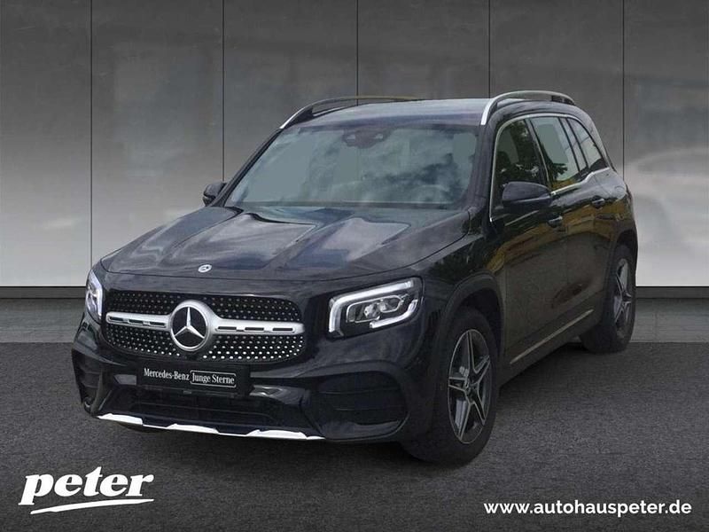 Metalliclack kosmosschwarz Gebraucht 2022 Mercedes GLB180 AMG SUV | 35.870 € (Fairer Preis) - Bild 1/4