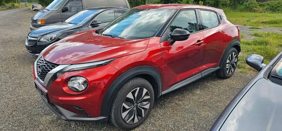 Gebraucht Nissan Juke Acenta 114 PS (83 kW) 2023 Rot (metallic) SUV