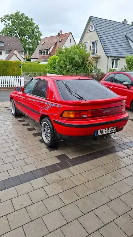 Gebraucht Mazda 323F 88 PS (64 kW) 1991 Rot Limousine