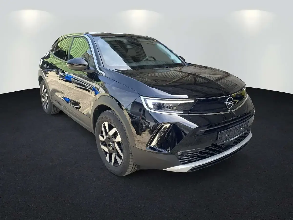Gebraucht Opel Mokka-e Elegance 100 kW (136 PS) 2022 Diamant schwarz/karbon schwarz (metallic) SUV