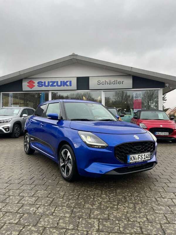 Blau Neu 2025 Suzuki Swift Comfort+ Kleinwagen | 21.990 € - Bild 1/4