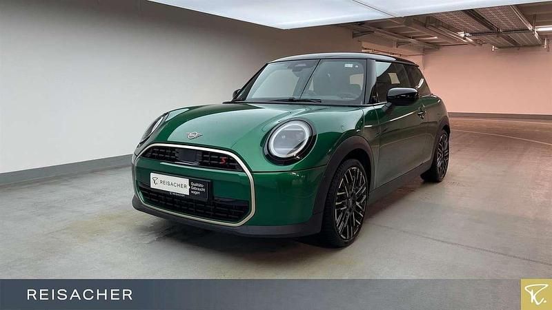 British racing green metallic Gebraucht 2024 Mini Cooper S Coupé Favoured Coupé | 31.588 € - Bild 1/4
