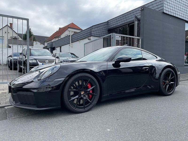 Tiefschwarzmetallic Neu 2025 Porsche 992 Coupé | 192.990 € - Bild 1/4