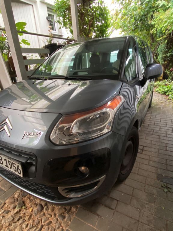 Grau Gebraucht 2009 Citroën C3 Picasso Advance Van / Kleinbus | 3.500 € (Fairer Preis) - Bild 1/4