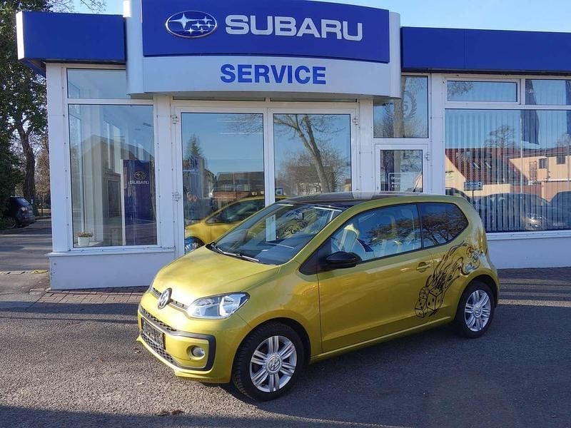 Gebraucht VW up! 75 PS (55 kW) 2017 Honey yellow metallic Kleinwagen