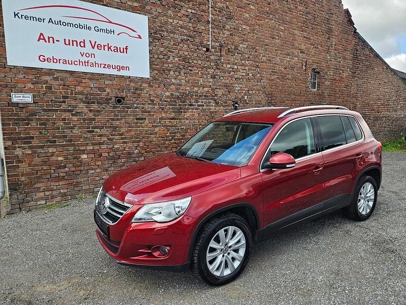Rot Gebraucht 2010 VW Tiguan Sportline SUV | 5.490 € (Fairer Preis) - Bild 1/4