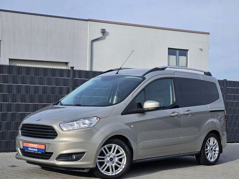 Silber Gebraucht 2016 Ford Tourneo Courier Titanium Van / Kleinbus | 7.950 € (Fairer Preis) - Bild 1/4