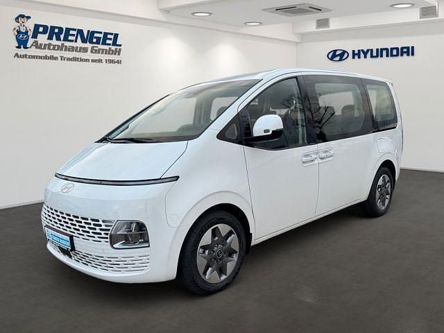 Creamy white Neu 2024 Hyundai Staria Trend Van | 44.987 € - Bild 1/4