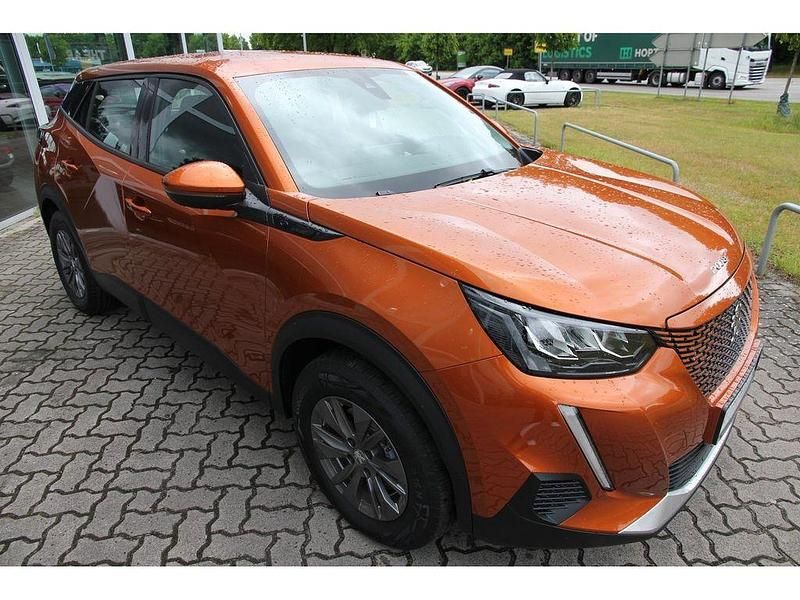 Gebraucht Peugeot e-2008 Active 100 kW (136 PS) 2021 Fusion orange SUV