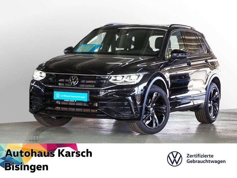 Deep black perleffekt (metallic) Gebraucht 2024 VW Tiguan R-line SUV | 42.845 € (Fairer Preis) - Bild 1/3