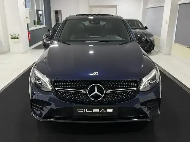 Gebraucht Mercedes GLC250 AMG 211 PS (155 kW) 2019 Cavansitblau  metalliclack Coupé