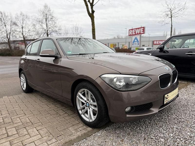 Braun Gebraucht 2013 BMW 118 Advantage Kleinwagen | 4.450 € (Superpreis) - Bild 1/4