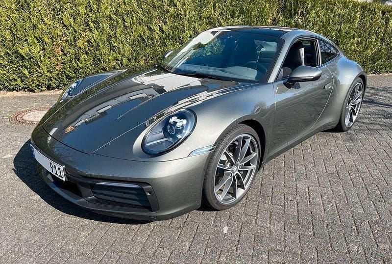 Grün Gebraucht 2023 Porsche 911 Carrera Coupé | 115.700 € (Superpreis) - Bild 1/4