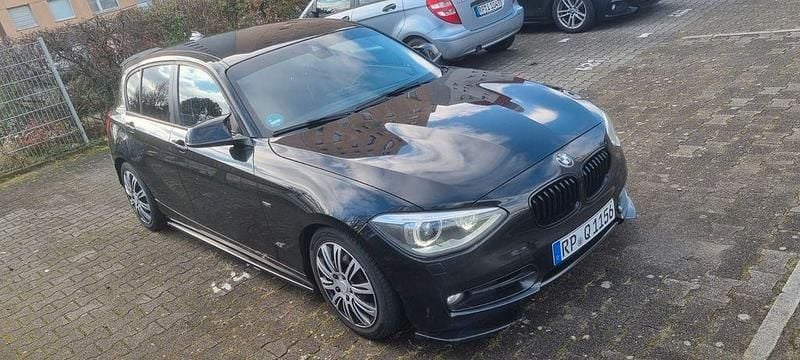 Gebraucht BMW 118 Sport Line 170 PS (125 kW) 2012 Schwarz Kleinwagen