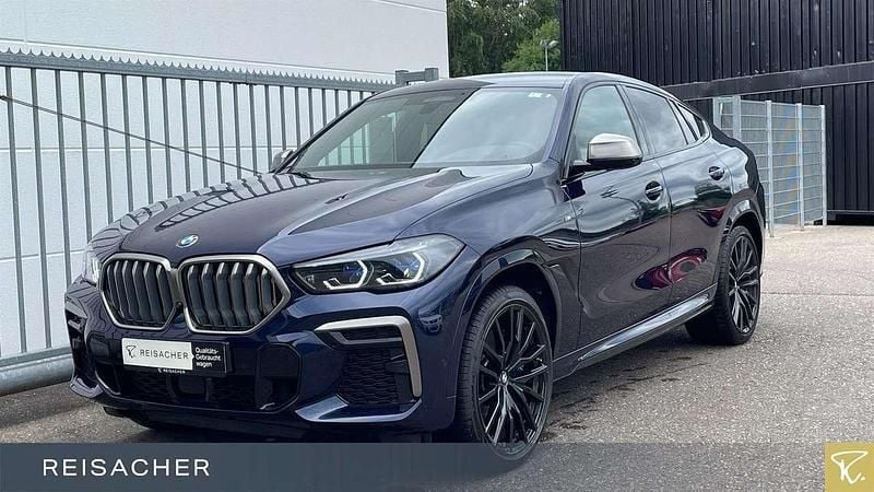 Tansanitblau ii metallic Gebraucht 2022 BMW X6 M SUV | 68.156 € (Fairer Preis) - Bild 1/4