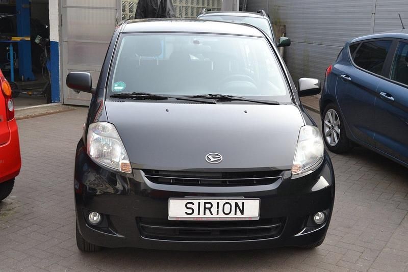 Gebraucht Daihatsu Sirion 69 PS (50 kW) 2011 Schwarz Kleinwagen