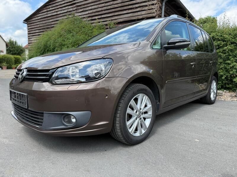 Braun Gebraucht 2012 VW Touran Style Van / Kleinbus | 8.300 € (Fairer Preis) - Bild 1/4