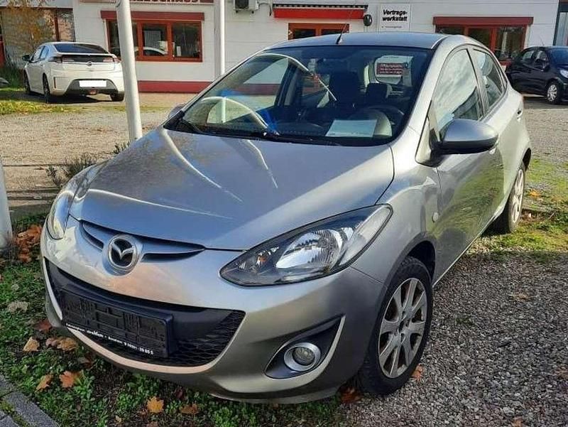 Grau Gebraucht 2012 Mazda 2 Active Limousine | 2.890 € (Fairer Preis) - Bild 1/4