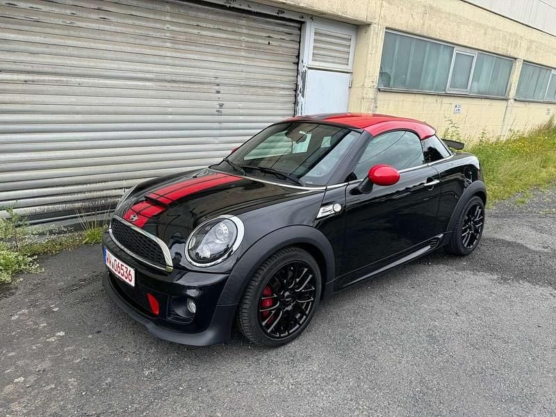 Midnight black metallic Gebraucht 2013 Mini John Cooper Works Coupé Coupé | 16.999 € - Bild 1/4