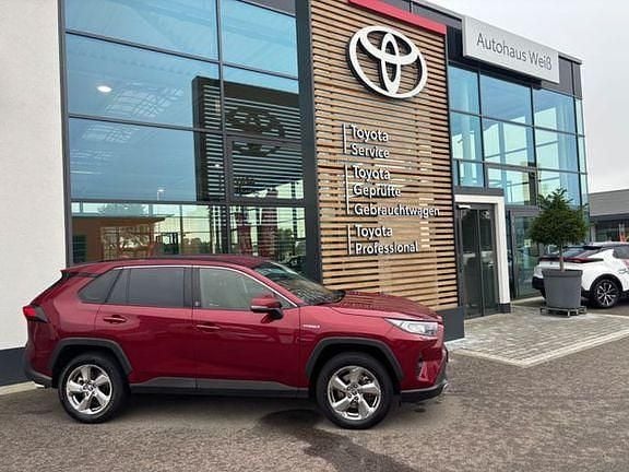 Tokiorot perleffekt Gebraucht 2021 Toyota RAV4 Hybrid Plus SUV | 31.900 € (Fairer Preis) - Bild 1/4