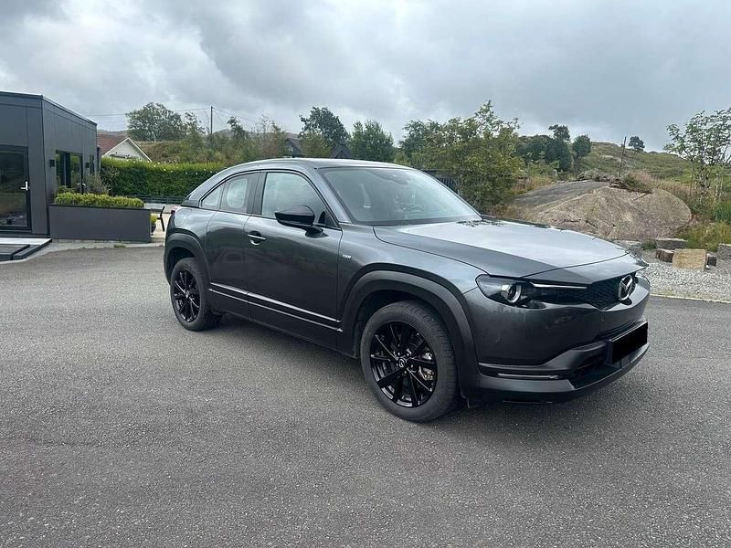 Grau Gebraucht 2024 Mazda MX30 Exclusive-Line SUV | 18.890 € (Guter Preis) - Bild 1/4