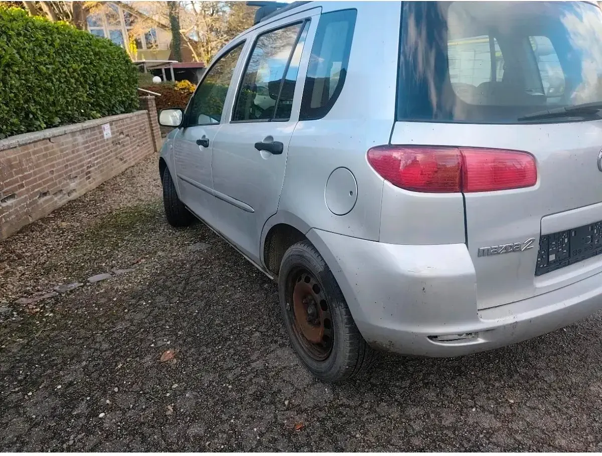 Używany Mazda 3 80 KM (58 kW) 2003 Szary Hatchback
