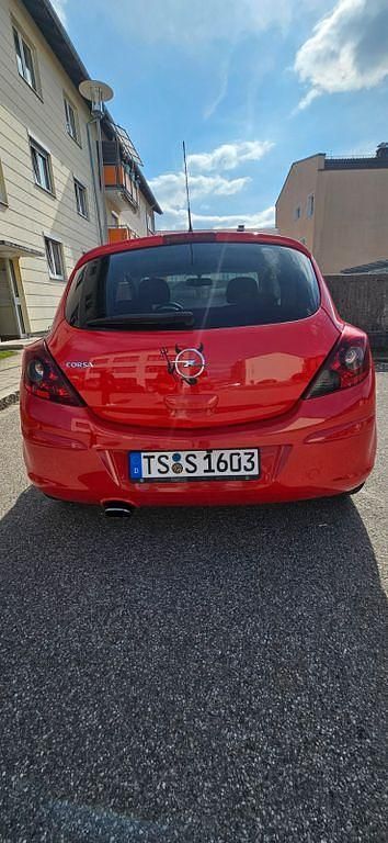 Gebraucht Opel Corsa Color Edition 80 PS (58 kW) 2009 Rot Kleinwagen