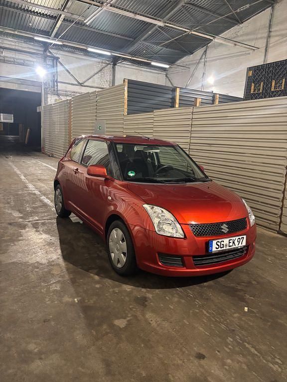 Gebraucht Suzuki Swift 92 PS (67 kW) 2010 Orange Kleinwagen