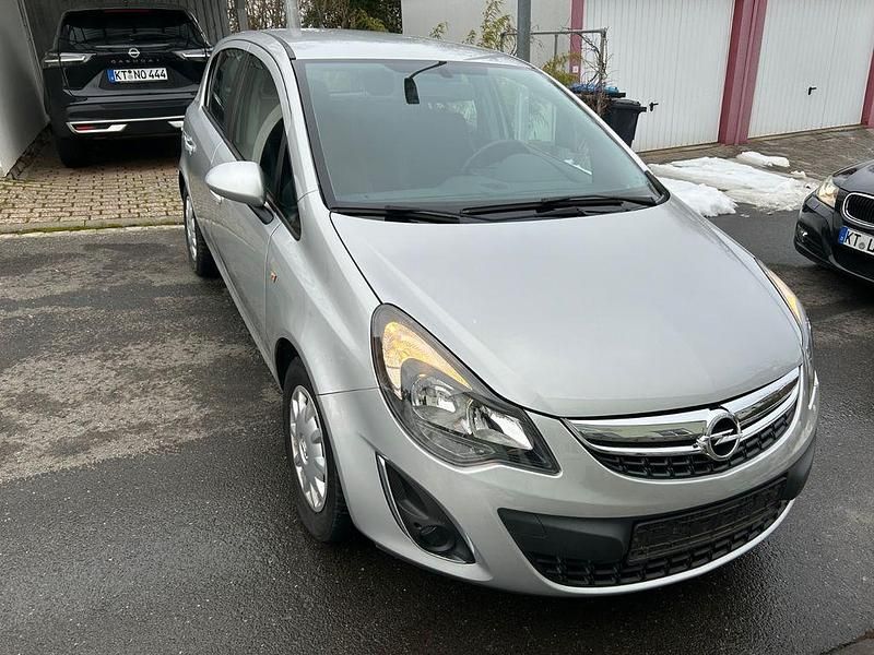 Grau Gebraucht 2014 Opel Corsa Color Edition Kleinwagen | 3.450 € (Fairer Preis) - Bild 1/4