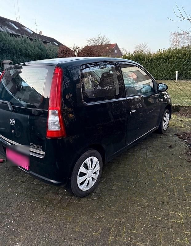Schwarz Gebraucht 2005 Daihatsu Cuore Kleinwagen | 400 € (Superpreis) - Bild 1/4