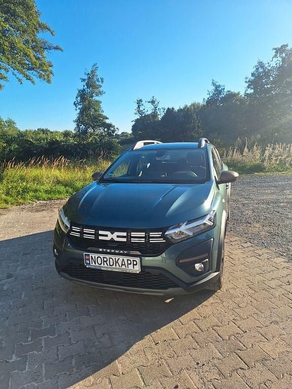 Grün Gebraucht 2023 Dacia Sandero Extreme Kleinwagen | 16.890 € (Guter Preis) - Bild 1/4