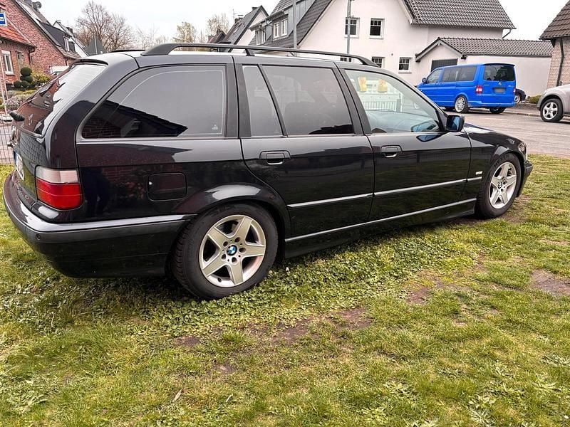 Gebraucht BMW 323 170 PS (125 kW) 1998 Schwarz Kombi
