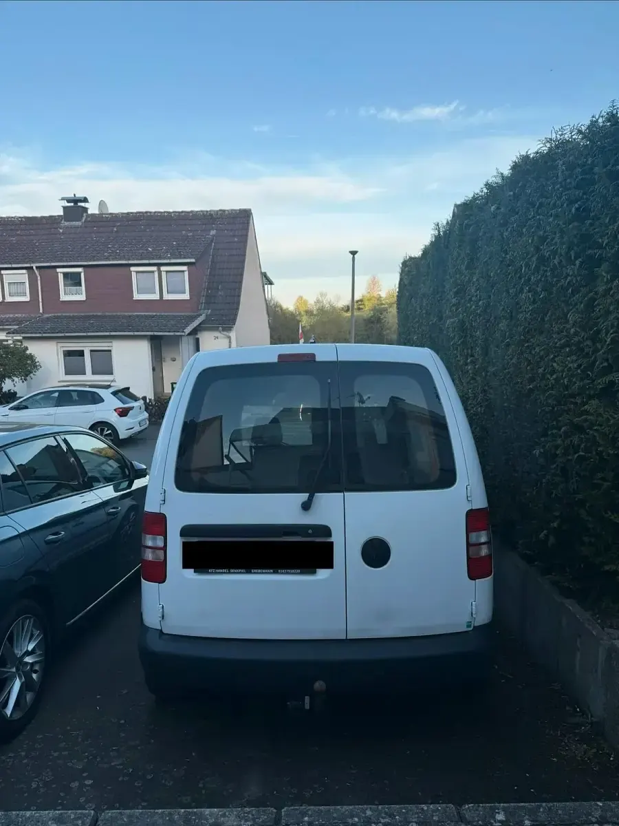 Używany VW Caddy 109 KM (80 kW) 2013 Biały Minivan